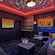 An artist rendering of a private karaoke room with Hercules artwork on the Disney Adventure
